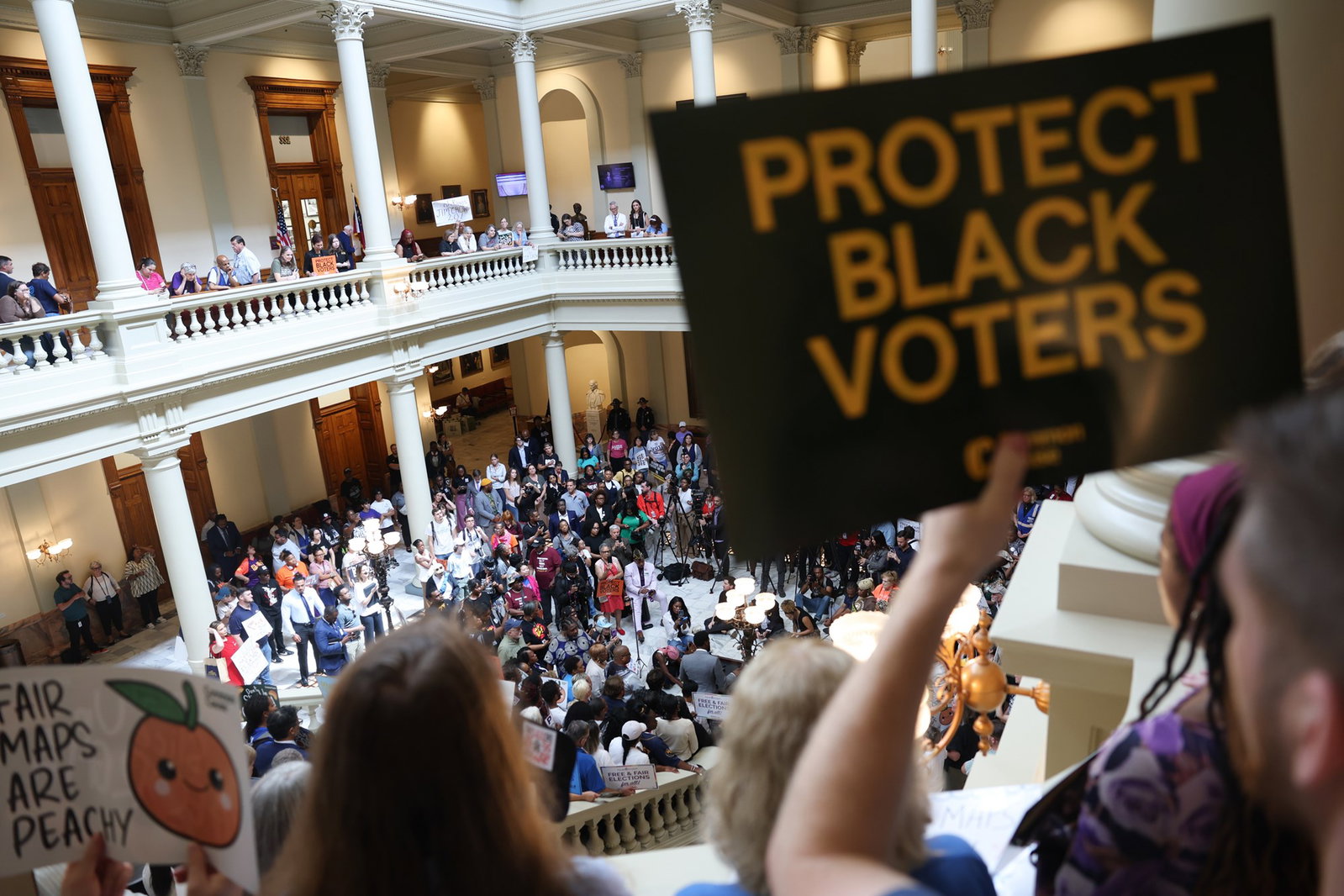 Crowds attend rally against gerrymandering at the capitol on Wednesday, June 17, 2026.
