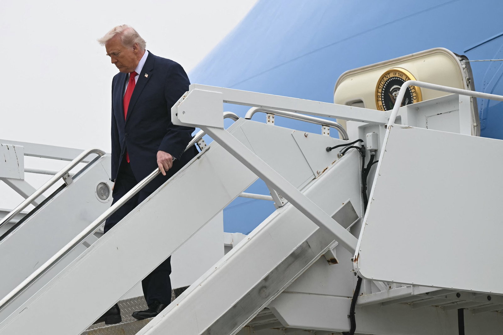 President Trump disembarks Air Force One at Dover Air Base in Delaware.