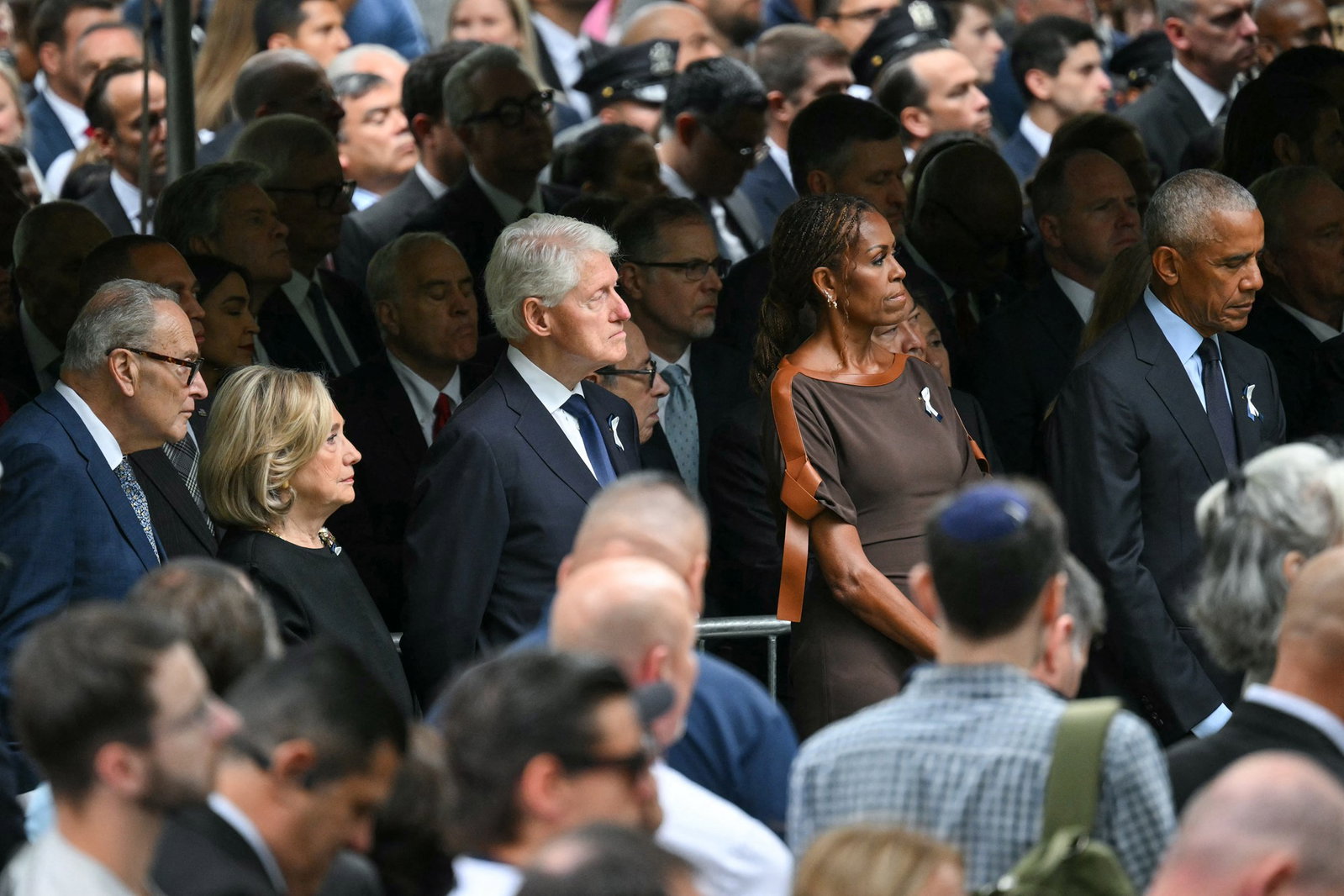 US Senate Minority Leader Chuck Schumer (D-NY), former Secretary of State Hillary Clinton, former US President Bill Clinton, former First Lady Michelle Obama, and former US President Barack Obama 