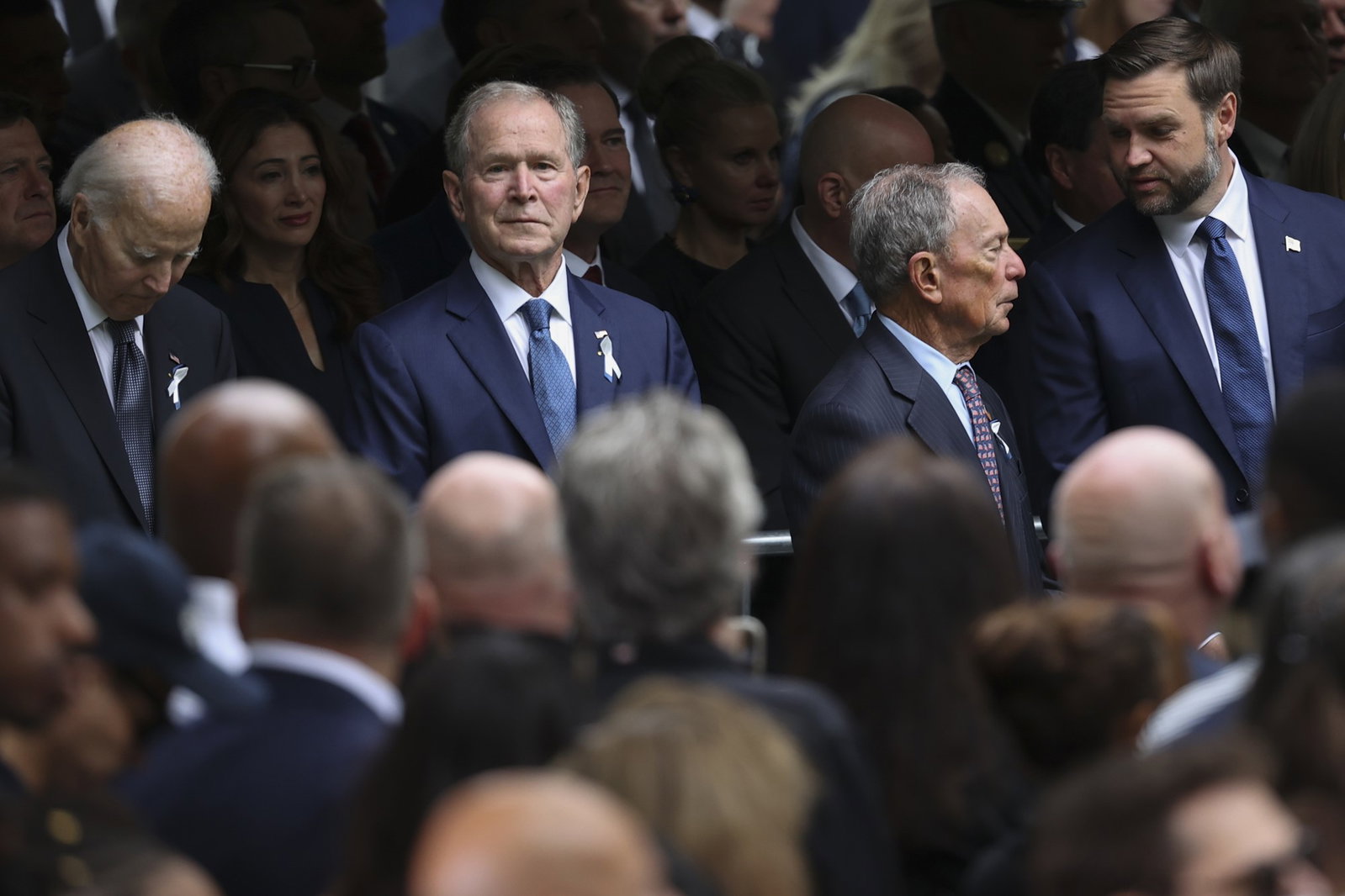 Former US presidents Joe Biden, George W. Bush, formeer New York mayor Michael Bloomberg and Vice President JD Vance