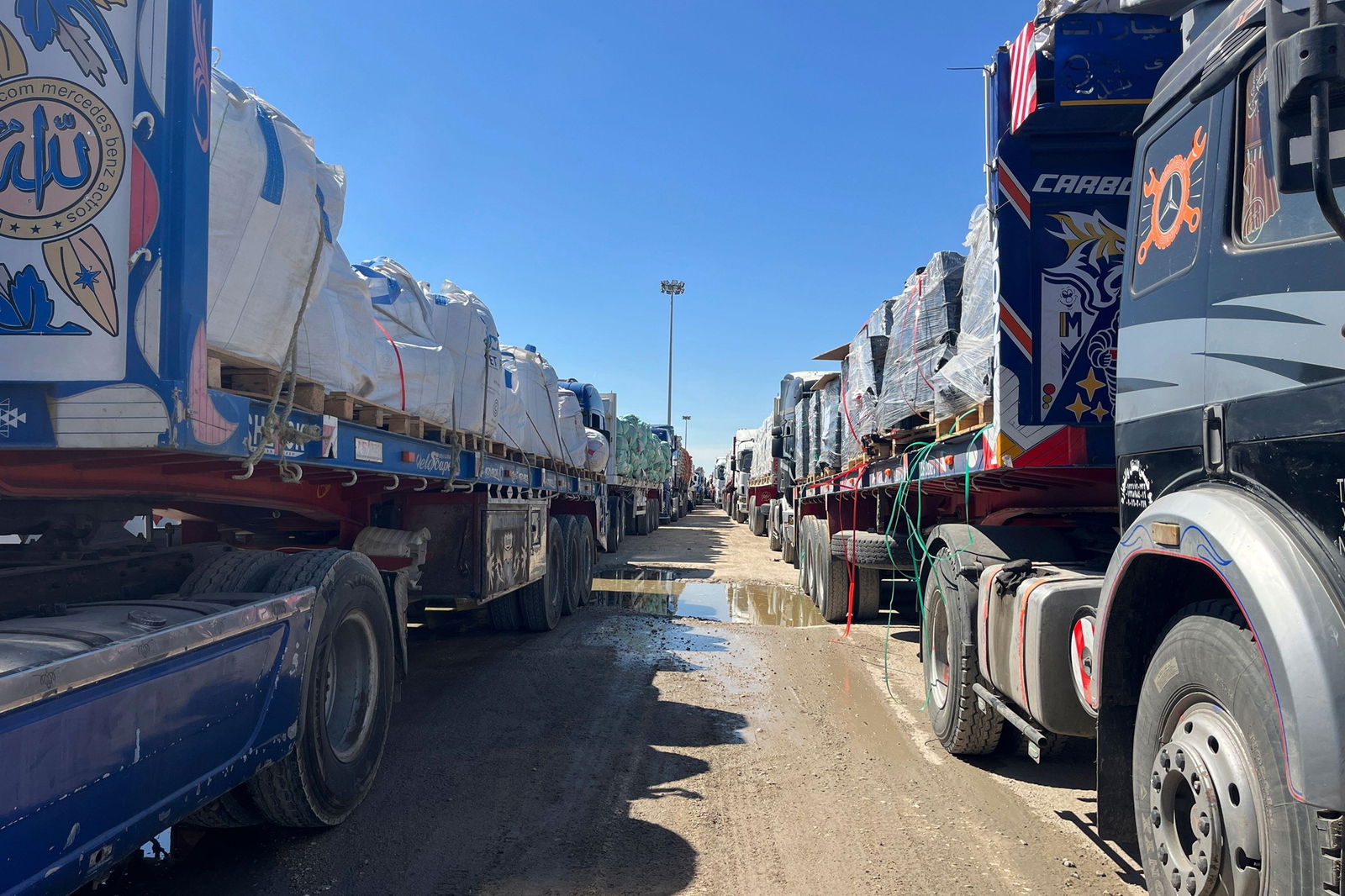 Trucks line up at the Egyptian side of the Rafah border in March.