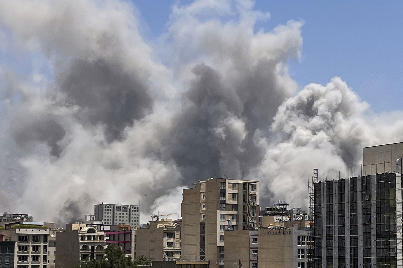 Smoke rises from a location allegedly IRGC's Sarallah Headquarters in north of Tehran, Iran after being targeted by Israel on June 23