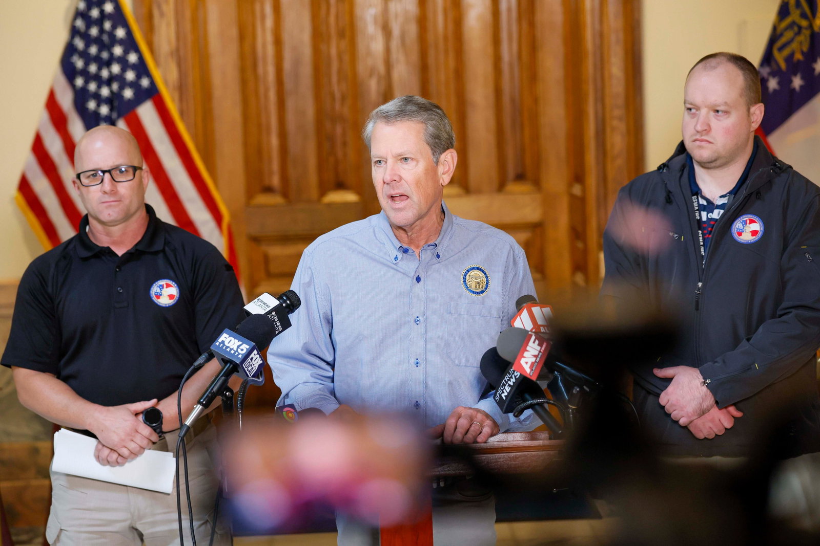Gov. Brian Kemp, accompanied by GEMA Director Josh Lamb and State Meteorologist Will Lanxton, briefed the media during a press conference at the Georgia State Capitol on Thursday, Oct. 8, 2026. (Miguel Martinez/AJC)