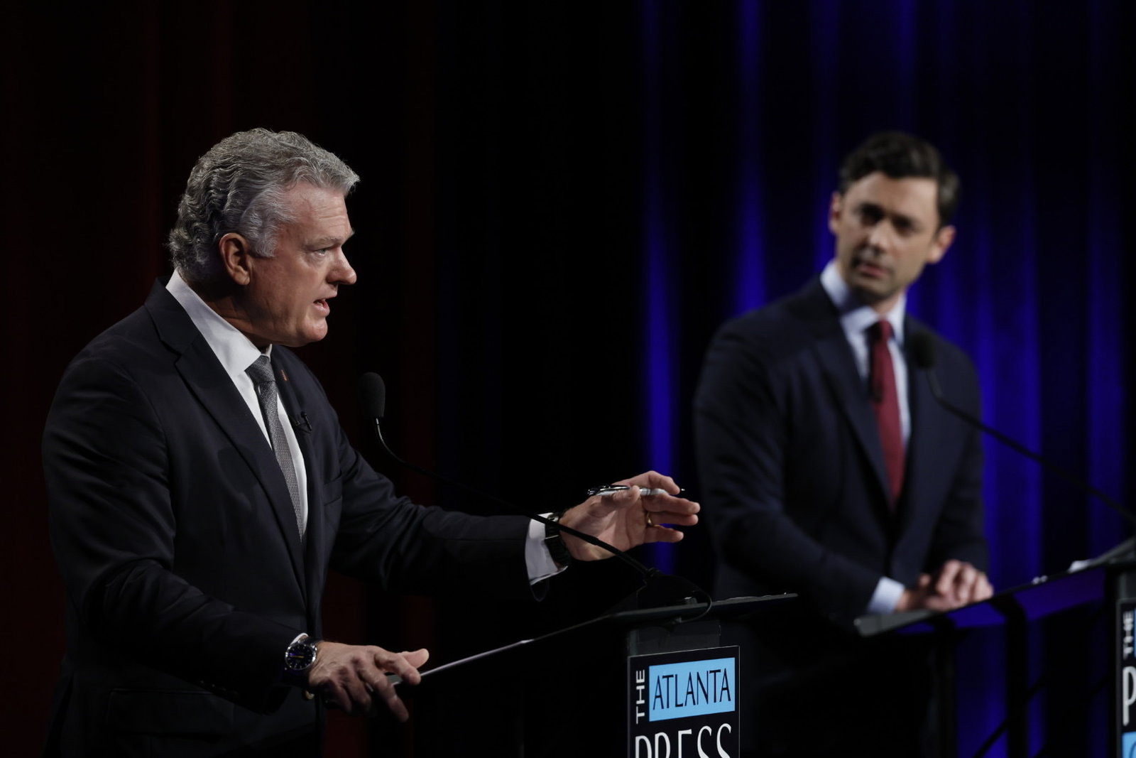 Republican U.S. Rep. Mike Collins (left) debates incumbent Democratic U.S. Sen Jon Ossoff during the Atlanta Press Club's Loudermilk-Young debate series Tuesday night.