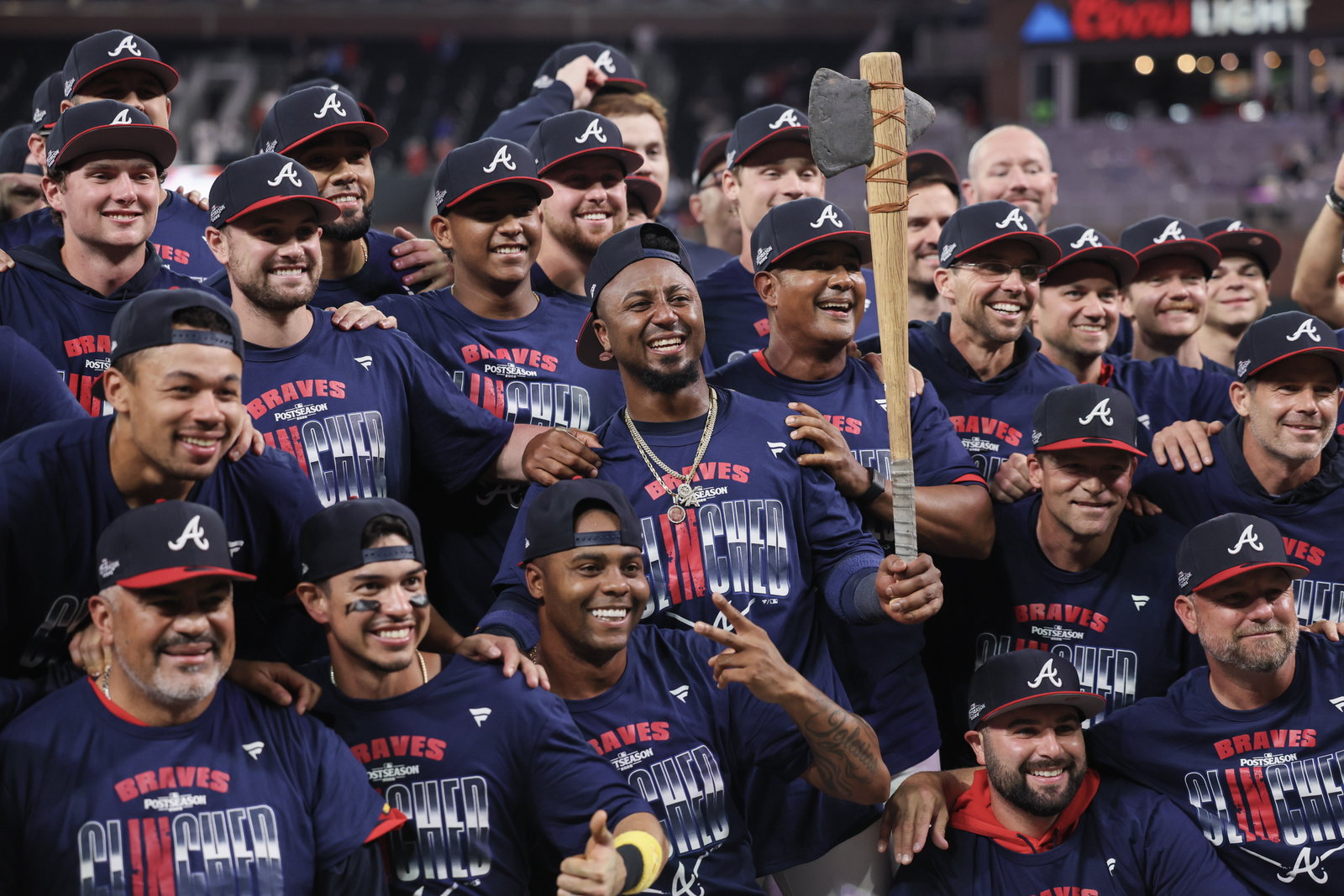The Atlanta Braves celebrate on the field after defeating the Philadelphia Phillies.