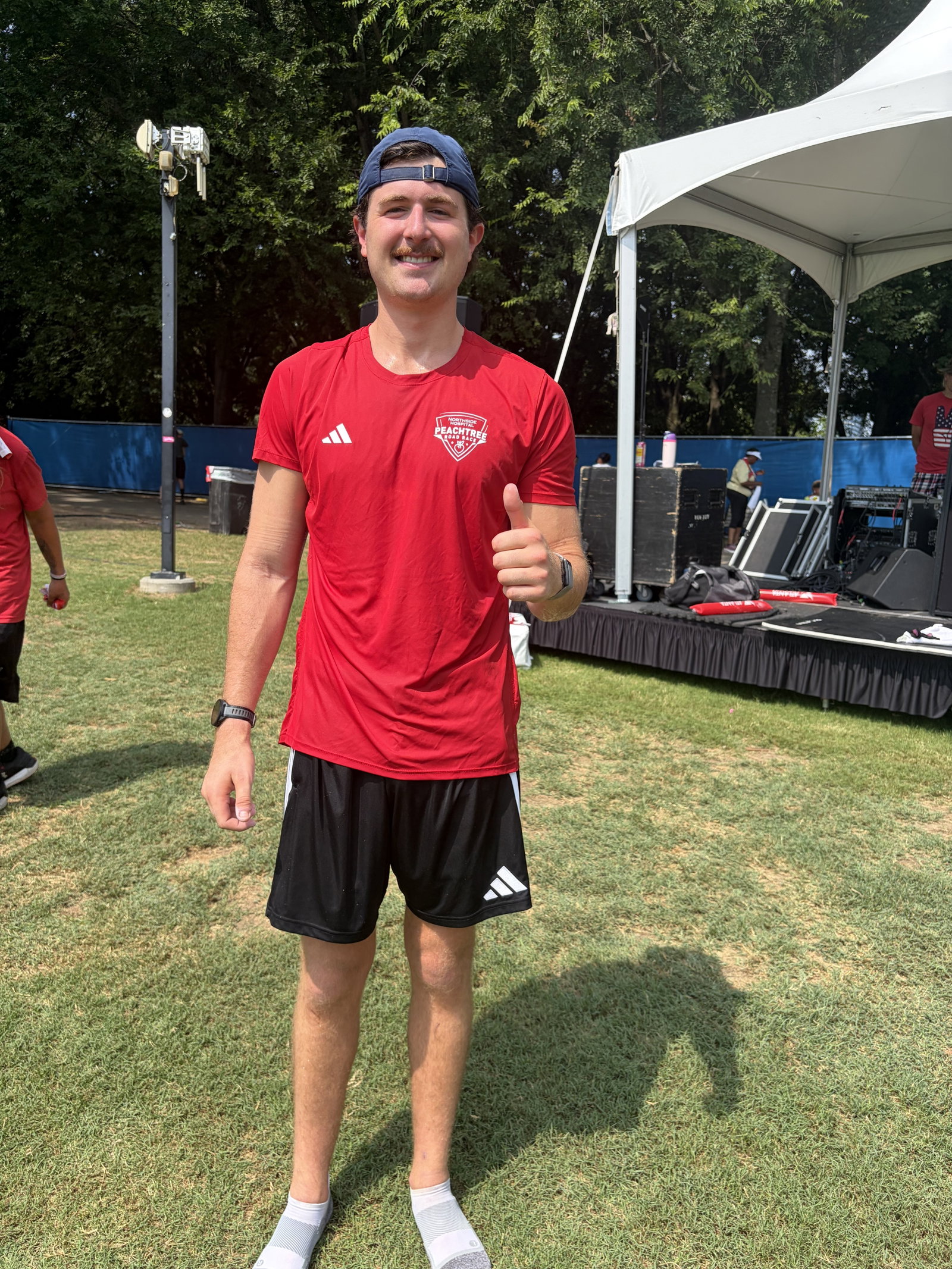Matt Valaoras held a plank throughout the Peachtree Road Race on Saturday in Atlanta.