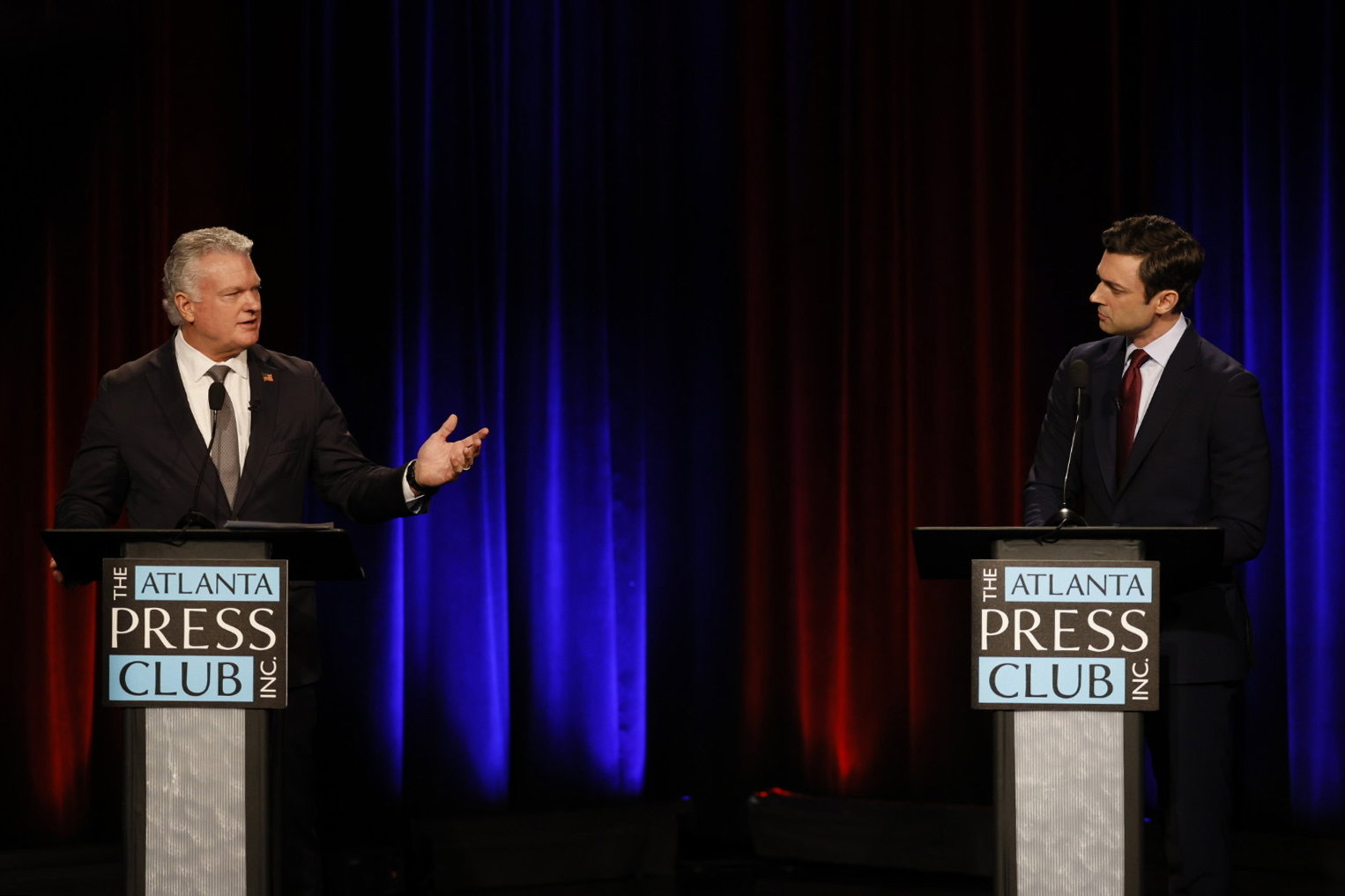 Republican U.S. Rep. Mike Collins (left) debates incumbent Democratic U.S. Sen Jon Ossoff during the Atlanta Press Club's Loudermilk-Young debate series Tuesday night.